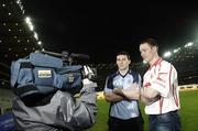 18 January 2007; Dublin captain Colin Moran, left, and Tyrone’s Cormac McGinley pose for a cameraman under the floodlights at Croke Park to launch Setanta Ireland’s National Football League coverage for 2007. Dublin’s Division 1A clash with Tyrone, the first match to be played under floodlights at Croke Park, will be shown exclusively live on Setanta Ireland at 7.00pm on Saturday February 3rd. Croke Park, Dublin. Picture credit: Brian Lawless / SPORTSFILE