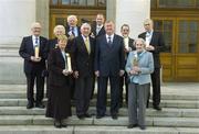 25 January 2007; Minister for Arts, Sport and Tourism John O'Donoghue T.D. with Olympic gold medalist and chairman of the selection committee Ronnie Delany with award winners, from left, Paddy O'Brien, Carmel Winkelmann, Kathleen Sythes, Harry Brooks, Eric Reilly, John Flynn, Elizabeth Foley, and Michael Logue at the announcement of the winners of the inaugural National Volunteers in Irish Sport Awards 2007. Government Buildings, Dublin. Picture credit: Pat Murphy / SPORTSFILE