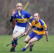 28 January 2007; Lar Corbett, Tipperary, in action against Alan Brigdale, Clare. Waterford Crystal Cup Semi Final, Clare v Tipperary, Meelick, Co. Clare. Picture Credit: Kieran Clancy / SPORTSFILE