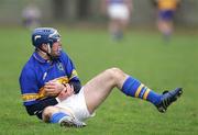 28 January 2007; Eoin Kelly, Tipperary, holds his injured hand after being struck by Colm Forde, Clare. Forde received a yellow card for the offence. Waterford Crystal Cup Semi Final, Clare v Tipperary, Meelick, Co. Clare. Picture Credit: Kieran Clancy / SPORTSFILE