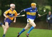 28 January 2007; Lar Corbett, Tipperary, in action against Kevin Dilleen, Clare. Waterford Crystal Cup Semi Final, Clare v Tipperary, Meelick, Co. Clare. Picture Credit: Kieran Clancy / SPORTSFILE