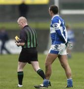 28 January 2007; Darren Rooney, Laois, is sent off by referee Derek Fahy, after being shown a second yellow card. O'Byrne Cup Final, Laois v Dublin, O'Connor Park, Tullamore, Co. Offaly. Picture Credit: David Maher / SPORTSFILE