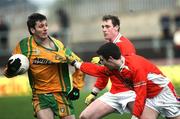 28 January 2007; Christy Toye, Donegal, in action against Brendan Donaghy, Armagh. McKenna Cup Semi Final, Armagh v Donegal, Healy Park, Omagh, Co. Tyrone. Picture Credit: Oliver McVeigh / SPORTSFILE