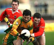 28 January 2007; Christy Toye, Donegal, in action against Brendan Donaghy, Armagh. McKenna Cup Semi Final, Armagh v Donegal, Healy Park, Omagh, Co. Tyrone. Picture Credit: Oliver McVeigh / SPORTSFILE