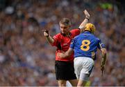 7 September 2014; Shane McGrath, Tipperary, runs past referee Barry Kelly after his side were awarded a free. GAA Hurling All Ireland Senior Championship Final, Kilkenny v Tipperary. Croke Park, Dublin. Picture credit: Piaras Ó Mídheach / SPORTSFILE