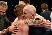 6 September 2014; Carl Frampton is congratulated by his manager Barry McGuigan after his victory over Kiko Martinez after their IBF Super-bantamweight Title Fight. Titanic Showdown, Carl Frampton v Kiko Martinez, IBF Super-bantamweight Title Fight. Titanic Quarter, Belfast, Co. Antrim. Picture credit: Ramsey Cardy / SPORTSFILE