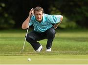 12 September 2014; Former Wexford hurler Rory McCarthy, representing St. Martin's GAA Club, Co. Wexford, lines up his putt on the 10th green during the 15th Annual All-Ireland GAA Golf Challenge. Waterford Castle Golf Club, Waterford. Picture credit: Matt Browne / SPORTSFILE
