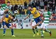 12 September 2014; Jason McGuinness, Shamrock Rovers, in action against Brian Garland and Dane Massey, Dundalk. FAI Ford Cup, Quarter-Final, Shamrock Rovers v Dundalk, Tallaght Stadium, Tallaght, Co. Dublin. Picture credit: David Maher / SPORTSFILE