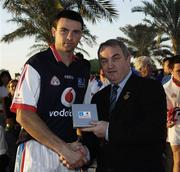 27 January 2007; GAA President Nickey Brennan presents a commerative medal to Alan Quirke, Cork, after the game.  Vodafone GAA All Stars Tour 2007, Vodafone All Stars Exhibition Game, Vodafone GAA All Stars 2005 v Vodafone GAA All Stars 2006, Dubai Polo and Equestrian Club, Arabian Ranches, Dubai, United Arab Emirates. Picture credit: Ray McManus / SPORTSFILE