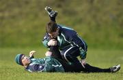 29 January 2007; Team doctor Dr. Gary O'Driscoll helps scrum-half Peter Stringer with some stretching exercises during Ireland rugby squad training. St Gerard's School, Bray, Co. Wicklow. Picture Credit: Brendan Moran / SPORTSFILE