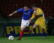 31 January 2007; Glen Ferguson, Linfield, is tackled by Martin Ferry, Limavady. Carnegie Premier League, Linfield v Limavady, Windsor Park, Belfast, Co. Antrim. Picture Credit: Oliver McVeigh / SPORTSFILE