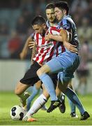 12 September 2014; Rory Patterson, Derry City, in action against Ciaran McGuigan, Drogheda United. FAI Ford Cup, Quarter-Final, Drogheda United v Derry City, United Park, Drogheda, Co. Louth. Photo by Sportsfile