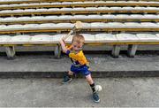 13 September 2014; Five year old Clare supporter Caoimhin Shannon, from Ennistymon, practices his hurling skills before the game. Bord Gáis Energy GAA Hurling Under 21 All-Ireland 'A' Championship Final, Clare v Wexford. Semple Stadium, Thurles, Co. Tipperary. Picture credit: Ray McManus / SPORTSFILE