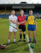 13 September 2014; The Kildare captain, Gerry Keegan, and the Roscommon captain, Hugh Rooney, shake hands accross referee Owen Elliott before the coin toss.  Bord Gáis Energy GAA Hurling Under 21 All-Ireland 'B' Championship Final, Roscommon v Kildare. Semple Stadium, Thurles, Co. Tipperary. Picture credit: Ray McManus / SPORTSFILE