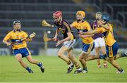 13 September 2014; Padraig Foley, Wexford, in action against Eoin Enright, left, and Shane O’ Donnell, Clare as David Reidy looks on. Bord Gáis Energy GAA Hurling Under 21 All-Ireland 'A' Championship Final, Clare v Wexford. Semple Stadium, Thurles, Co. Tipperary. Picture credit: Ray McManus / SPORTSFILE