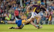 13 September 2014; Kevin Foley, Wexford, in action against Gearóid O'Connell, Clare. Bord Gáis Energy GAA Hurling Under 21 All-Ireland 'A' Championship Final, Clare v Wexford. Semple Stadium, Thurles, Co. Tipperary. Picture credit: Ray McManus / SPORTSFILE