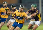 13 September 2014; David Reidy, Clare, in action against Conor Devitt, Wexford. Bord Gáis Energy GAA Hurling Under 21 All-Ireland 'A' Championship Final, Clare v Wexford. Semple Stadium, Thurles, Co. Tipperary. Picture credit: Ray McManus / SPORTSFILE