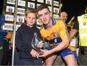 13 September 2014; Jayden Cheevers, aged 9, from Wexford, presents Clare captain Tony Kelly with the man of the match award. Bord Gáis Energy GAA Hurling Under 21 All-Ireland 'A' Championship Final, Clare v Wexford. Semple Stadium, Thurles, Co. Tipperary. Picture credit: Ray McManus / SPORTSFILE