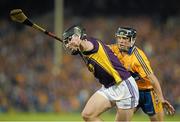 13 September 2014; Andrew Kenny, Wexford, in action against David Reidy, Clare. Bord Gáis Energy GAA Hurling Under 21 All-Ireland 'A' Championship Final, Clare v Wexford. Semple Stadium, Thurles, Co. Tipperary. Picture credit: Ray McManus / SPORTSFILE