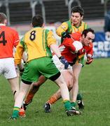 28 January 2007; Malachy Mackin, Armagh, in action against Christy Toye, Donegal. McKenna Cup Semi Final, Armagh v Donegal, Healy Park, Omagh, Co. Tyrone. Picture Credit: Oliver McVeigh / SPORTSFILE