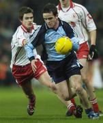 3 February 2007; Gerard Brennan, Dublin, in action against Raymond Mulgrew, Tyrone. Allianz NFL Division 1A, Dublin v Tyrone, Croke Park, Dublin. Photo by Sportsfile *** Local Caption ***
