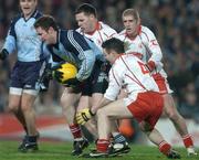 3 February 2007; Kevin Bonner, Dublin, in action against Michael McGee, 4, Conor Gormley, left, and Kevin Hughes, right, Tyrone. Allianz NFL Division 1A, Dublin v Tyrone, Croke Park, Dublin. Picture credit: Pat Murphy / SPORTSFILE