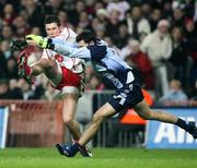 3 February 2007; Sean Cavanagh, Tyrone, kicks over a point, against Alan Brogan, Dublin . Allianz NFL Division 1A, Dublin v Tyrone, Croke Park, Dublin. Picture credit: Oliver McVeigh / SPORTSFILE