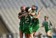 14 September 2014; Limerick players Sarah Carey, left, Fiona Hickety, and Katie Campbell, right, celebrate at the final whistle. All Ireland Intermediate Camogie Championship Final, Kilkenny v Limerick, Croke Park, Dublin. Photo by Sportsfile