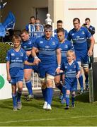 13 September 2014; Matchday mascots Sasha Savchenko, Wicklow RFC, left, and Gordon Barr, Clontarf RFC, right, with Leinster captain Jamie Heaslip. Guinness PRO12, Round 2, Leinster v Scarlets. RDS, Ballsbridge, Dublin. Picture credit: Stephen McCarthy / SPORTSFILE