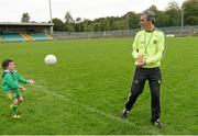 15 September 2014; Donegal manager Jim McGuinness plays with his 5 year old son Mark after a squad training and press day ahead of the All-Ireland Senior Football Final. MacCumhaill Park, Ballybofey, Co. Donegal. Picture credit: Oliver McVeigh / SPORTSFILE