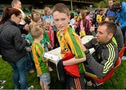 15 September 2014; Donegal's Karl Lacey signing autographs after squad training ahead of the All-Ireland Senior Football Final. MacCumhaill Park, Ballybofey, Co. Donegal. Picture credit: Oliver McVeigh / SPORTSFILE