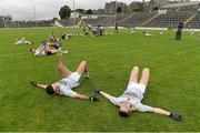15 September 2014; Kerry's Aidan O'Mahony and Marc O Sé do some stretching during a squad training and press day ahead of the All-Ireland Senior Football Final. Fitzgerald Stadium, Killarney, Co. Kerry. Picture credit: Brendan Moran / SPORTSFILE