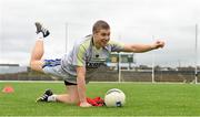 15 September 2014; Kerry's Peter Crowley does some stretching during a squad training and press day ahead of the All-Ireland Senior Football Final. Fitzgerald Stadium, Killarney, Co. Kerry. Picture credit: Brendan Moran / SPORTSFILE