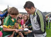 15 September 2014; Kerry's David Moran signs autographs for supporters after a squad training and press day ahead of the All-Ireland Senior Football Final. Fitzgerald Stadium, Killarney, Co. Kerry. Picture credit: Brendan Moran / SPORTSFILE