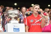 14 September 2014; Cork captain Anna Geary with the O'Duffy Cup during her post-match speech. Liberty Insurance All Ireland Senior Camogie Championship Final, Kilkenny v Cork, Croke Park, Dublin. Picture credit: Ramsey Cardy / SPORTSFILE