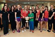 15 September 2014; Charlie Barrett, age 11, from Leixlip, Co. Kildare, with members of the Cork camogie team, during a visit by the All-Ireland Senior & Intermediate Camogie Champions to Our Lady's Children's Hospital, Crumlin. Picture credit: David Maher / SPORTSFILE