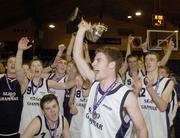 30 January 2007; Dane Torsney, Sligo Grammar School, lifts the cup in front of his team after they beat Colaiste Choilm Tullamore. U19.C. Boy's Schools Cup Finals, Sligo Grammar School v Colaiste Choilm Tullamore, National Basketball Arena, Tallaght, Dublin. Photo by Sportsfile  *** Local Caption ***