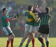 3 February 2007; Referee Maurice Deegan tries to seperate Darragh O Se, Kerry, and David Brady, Mayo. Allianz NFL Division 1A, Mayo V Kerry, Castlebar. Photo by Sportsfile *** Local Caption ***