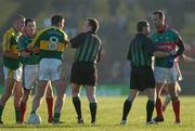 3 February 2007; Referee Maurice Deegan restrains Darragh O Se, Kerry, from David Brady, Mayo. Allianz NFL Division 1A, Mayo V Kerry, Castlebar. Photo by Sportsfile *** Local Caption ***