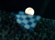 3 February 2007; A Dublin flag is waved in front of a full moon. Allianz NFL Division 1A, Dublin v Tyrone, Croke Park, Dublin. Photo by Sportsfile *** Local Caption ***