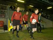 7 February 2007; Referee Derek Tomney leads the teams onto the field alongside linesmen Andrew Maher, left, Robert Daly, right, and fourth official Rhona Daly. Under 18's International, Republic of Ireland v Holland, Richmond Park, Dublin. Picture Credit: Pat Murphy / SPORTSFILE