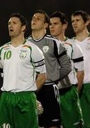 7 February 2007; Republic of Ireland players, left to right, Robbie Keane, Wayne Henderson, Steve Finnan, and Kevin Kilbane, stand for the National Anthem. 2008 European Championship Qualifier, Republic of Ireland v San Marino, Serravalle Stadium, San Marino. Picture Credit: Brian Lawless / SPORTSFILE