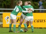 10 February 2007; Ireland's Jeannette Feighery, centre, celebrates with team-mates Shannon Houston, left, and Lynne Cantwell, right, after scoring her side's opening try. Women's Six Nations Rugby, Ireland v France, Templeville Road, Dublin. Picture Credit: Pat Murphy / SPORTSFILE