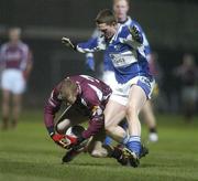 10 February 2007; Michael Comer, Galway, in action against Paul Lawlor, Laois. Allianz National Football League, Division 1B, Round 2, Laois v Galway, O'Moore Park, Portlaoise, Co. Laois. Picture Credit: Pat Murphy / SPORTSFILE