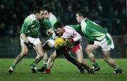 10 February 2007; Enda McGinley, Tyrone, in action against Peter Sherry and Hugh Brady, Fermanagh. Allianz National Football League, Division 1A, Round 2, Tyrone v Fermanagh, Healy Park, Omagh, Co. Tyrone. Picture Credit: Oliver McVeigh / SPORTSFILE