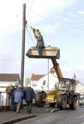 11 February 2007; Armagh flags are put up on poles before the game. Allianz National Football League, Division 1B, Round 2, Armagh v Louth, Oliver Plunkett Park, Crossmaglen, Co. Armagh. Photo by Sportsfile *** Local Caption ***