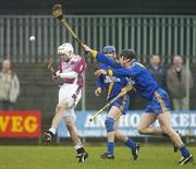 11 February 2007; Eunan McKillop, Cushendall, has his clearence charged down by Johnny Maher, Loughrea. AIB All-Ireland Senior Club Hurling Championship Semi-Final, Loughrea v Cushendall, Cusack Park, Mullingar, Co. Westmeath. Picture Credit: Pat Murphy / SPORTSFILE