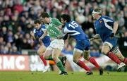 11 February 2007; Marcus Horan, Ireland, is held back by French full-back Clement Piotrenaud, after kicking through. RBS Six Nations Rugby Championship, Ireland v France, Croke Park, Dublin. Picture Credit: Brendan Moran / SPORTSFILE