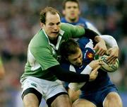 11 February 2007; Pierre Mignoni, France, is tackled by Girvan Dempsey, Ireland. RBS Six Nations Rugby Championship, Ireland v France, Croke Park, Dublin. Picture Credit: Brendan Moran / SPORTSFILE