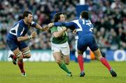 11 February 2007; Isaac Boss, Ireland, is tackled by Lionel Nallet, left, and Yannick Jauzion, France. RBS Six Nations Rugby Championship, Ireland v France, Croke Park, Dublin. Picture Credit: Brendan Moran / SPORTSFILE